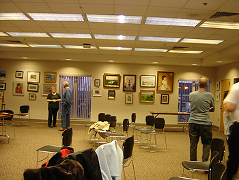 Annual Visual Arts Exhibit, Member artists hanging artwork for exhibit