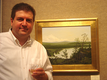 John O'Keefe Jr by his painting 'River Through the Adirondacks'