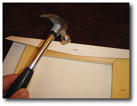 8 x 10 Canvas Stretching - Step 21 - Seat staple with hammer if not fully inserted